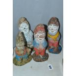 FOUR GARDEN GNOMES, weathered, height of tallest approximately 20cm