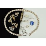 A SELECTION OF SILVER AND WHITE METAL JEWELLERY to include an expandable child's bangle, a charm