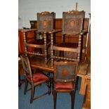 A SET OF SIX EARLY 20TH CENTURY OAK DINING CHAIRS, with circular can back joined by a central