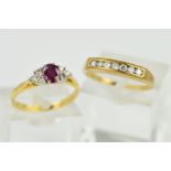 TWO GOLD GEM RINGS, the first a 9ct gold seven stone diamond channel set ring, estimated total