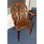 A 19TH CENTURY YEW WOOD AND ELM STICK BACK WINDSOR ARMCHAIR, on a crinoline stretcher