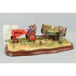 A LIMITED EDITION BORDER FINE ARTS FIGURE GROUP, 'Cut and Crated' (Allis Chalmers Tractor) No1642/