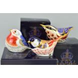 THREE BOXED ROYAL CROWN DERBY BIRD PAPERWEIGHTS, 'Nuthatch', 'Anniversary Robin' (collectors Guild