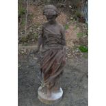 A HEAVY CAST IRON GARDEN FIGURE of a standing lady, height 152cm