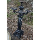 A DECORATIVE CAST IRON FIVE BRANCH GARDEN STAND/FEATURE above a semi clad lady, raised on a square