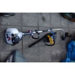 A SPEAR AND JACKSON SPJGT30 PETROL STRIMMER together with a Royal rbk4645 petrol chainsaw (2)