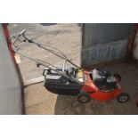 A ROVER SELF PROPELLED PETROL LAWNMOWER with grass box