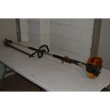 A STIHL HL75 LONG REACH MULTI ANGLED PETROL HEDGE TRIMMER (missing cover) (pulls but doesn't fire)