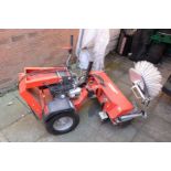 A KERSTEN K820 PETROL TWO WHEELED SWEEPER with collection box