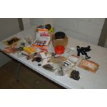 A BOX PLUS LOOSE CONTAINING A QUANTITY OF STIHL AND MAKITA SPARES, to include two strimmer heads,