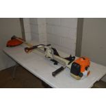 A STIHL FS400 PETROL STRIMMER with back strap attachment (working)