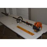 A STIHL HL75 LONG REACH MULTI ANGLED PETROL HEDGE TRIMMER (working)