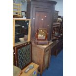 A GEORGIAN OAK PANELLED SINGLE DOOR CORNER CUPBOARD, together with a Victorian swing mirror, two