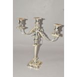 AN ELIZABETH II SILVER THREE LIGHT CANDELABRUM OF VICTORIAN STYLE, shaped square detachable sconces,
