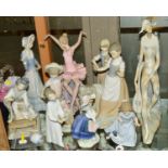A GROUP OF FIGURES, to include Lladro and Nao, (mostly with damage), Nao girl with dog, large Nao '