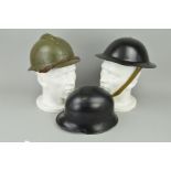 A BLACK COLOURED STEEL, German WWII era Fire Department Helmet complete with all inner and strap,