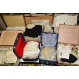 SEVEN SUITCASES OF VICTORIAN AND LATER LINEN, LACE, HEADRESSES ETC