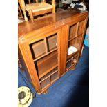 AN ART DECO OAK ASTRAGAL GLAZED TWO DOOR BOOKCASE, width 106cm x depth 32cm x height 116cm