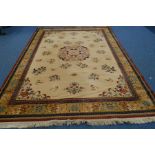 A 20TH CENTURY KHAMIR CARPET SQUARE, russet and cream ground, approximately 335cm x 243cm, marked to