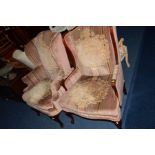 A STRIPPED PINK UPHOLSTERED WING BACK ARMCHAIR, on cabriole legs, together with a matching
