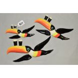 A SET OF THREE GRADUATING TOUCAN GUINNESS REPRODUCTION WALL PLAQUES