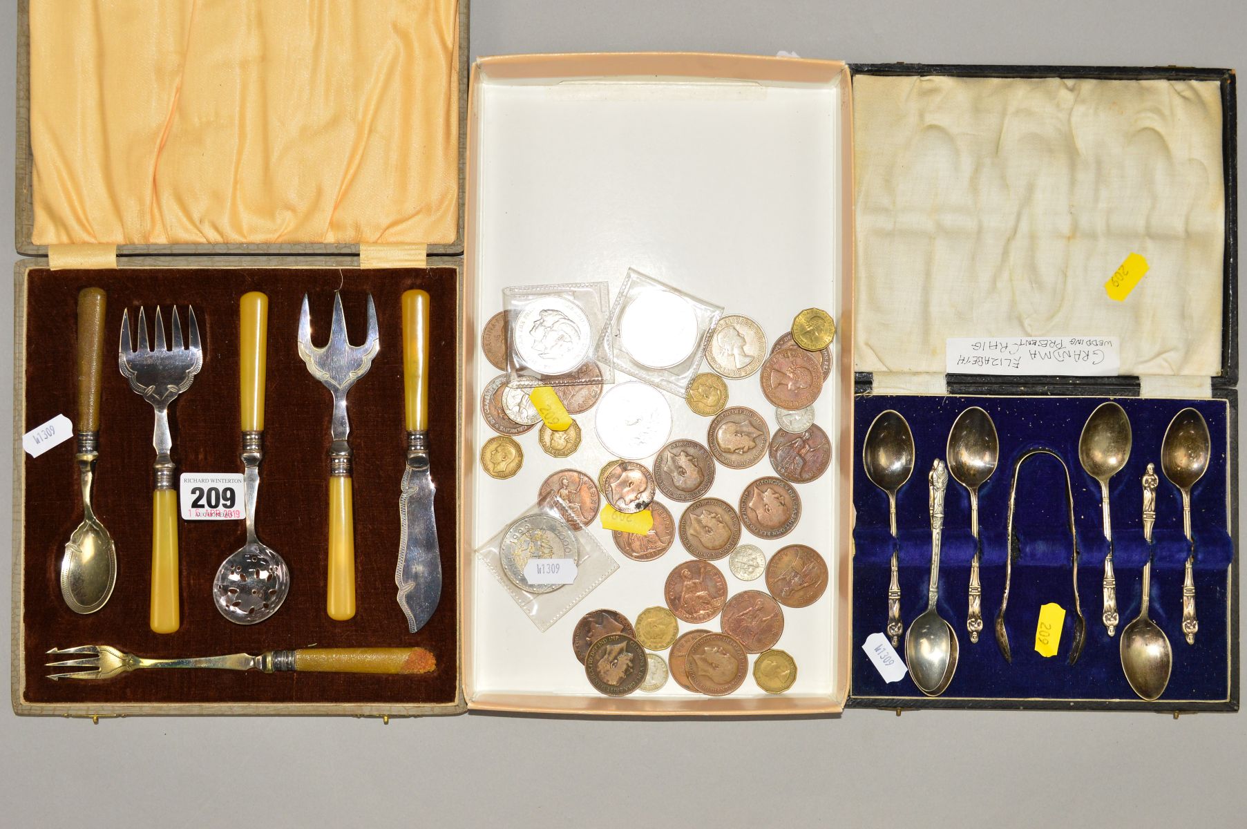 A CASED SET OF EPNS SERVING UTENSILS, s.d. to two handles, together with a cased set of plated