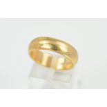 A LATE 20TH CENTURY 9CT GOLD PLAIN WEDDING RING, measuring approximately 11.7mm in width, hallmarked