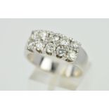 A DIAMOND RING, designed as two rows of five brilliant cut diamonds all within four claw settings,