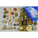 THREE PLASTIC BOXES CONTAINING A NUMBER OF BRITISH MILITARY CAP BADGES, PINS BOTH UK AND GERMANY,