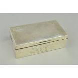 A GEORGE V SILVER RECTANGULAR CIGARETTE BOX, engine turned cover with initials to top left corner,