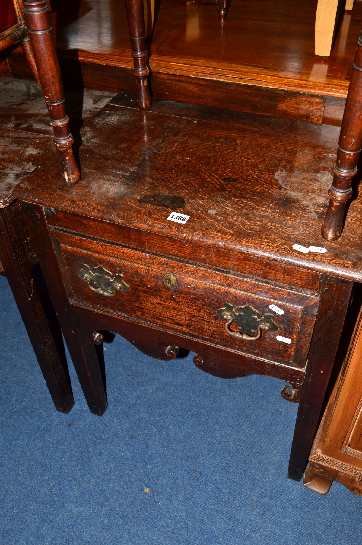 AN 18TH CENTURY AND LATER OAK LOWBOY, with single long drawer, wavy apron on square legs, width 61cm