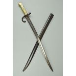 A FRENCH CHASSEPOT BAYONET AND SCABBARD, blade is marked 'Chatellerault 1872' scabbard does not bear