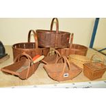 A COLLECTION OF WOODEN TRUGS, etc, to include a miniature wicker picnic basket and fishing reel