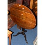 A GEORGIAN OAK CIRCULAR TOPPED TRIPOD TABLE