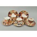 FIVE ROYAL CROWN DERBY COFFEE CUPS AND SAUCERS, from 'The Curator's Collection' to include 'Tree