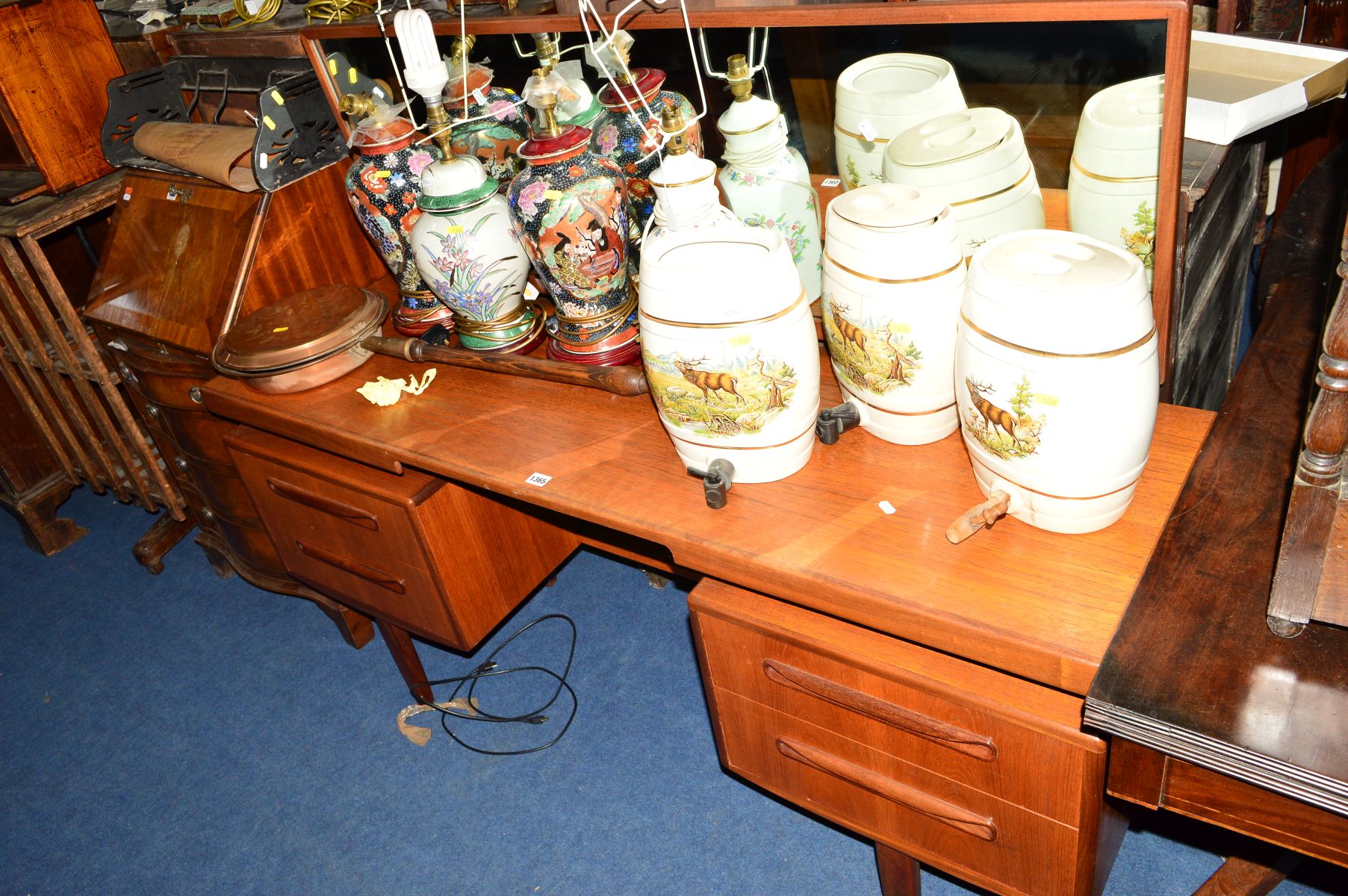 A G-PLAN FRESCO TEAK DRESSING TABLE, with rectangular mirror and four drawers, width 153cm (losses)