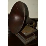 A DISTRESSED HIS MASTERS VOICE WIND-UP GRAMOPHONE, with a wooden horn