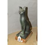 A BRONZED SCULPTURE OF A CAT BY AUSTIN PRODUCTIONS OF AMERICA, circa 1965, set onto a wooden plinth,