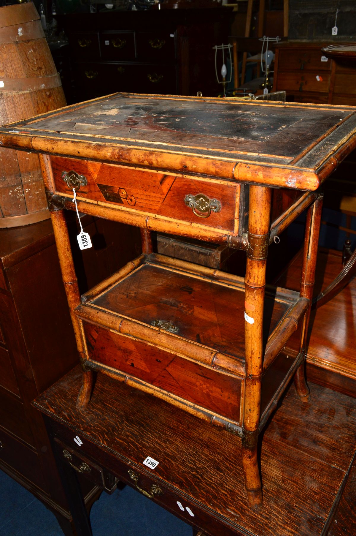 A DISTRESSED VICTORIAN BAMBOO SIDE TABLE, with parquetry multi specimen wood detail, single drawer