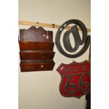 AN EDWARDIAN STAINED PINE THREE TIER WALL MOUNTED MAGAZINE RACK, together with an aluminium '@' sign