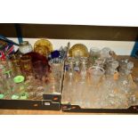 FOUR BOXES OF ASSORTED GLASSWARE, to include cut glass decanters, drinking glasses, dishes,
