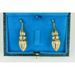 A PAIR OF DROP EARRINGS, designed as hollow pear shapes with pinched centres and banded detail, to