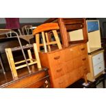 A TEAK CHEST OF THREE DRAWERS, two modern bedside chests, teak tile topped nest of tables, four