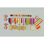 A WWII GROUP OF MEDALS, on a wearing bar to include 1939-45, Africa (1st Army bar), Italy, France