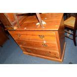 AN EDWARDIAN PITCH PINE CHEST OF THREE LONG DRAWERS, width 95cm x depth 46cm x height 80cm