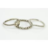 THREE PANDORA RINGS, the first with a beaded band and heart shape colourless paste, the second a