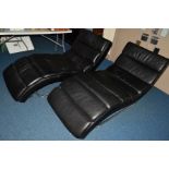 A PAIR OF BLACK LEATHER RECLINING SETTEE'S, on chrome legs, width 78cm