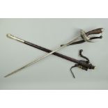 A 1912 PATTERN BRITISH INFANTRY/CAVALRY OFFICERS SWORD BY WILKINSON, complete with leather/metal
