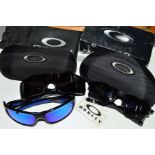 THREE PAIRS OF OAKLEY SUNGLASSES, which included one pair of Turbine, one pair of Fuel Cell and a