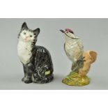 A BESWICK LESSER SPOTTED WOODPECKER, No2420 and a Beswick Cat, seated, No1030, grey, striped (2)